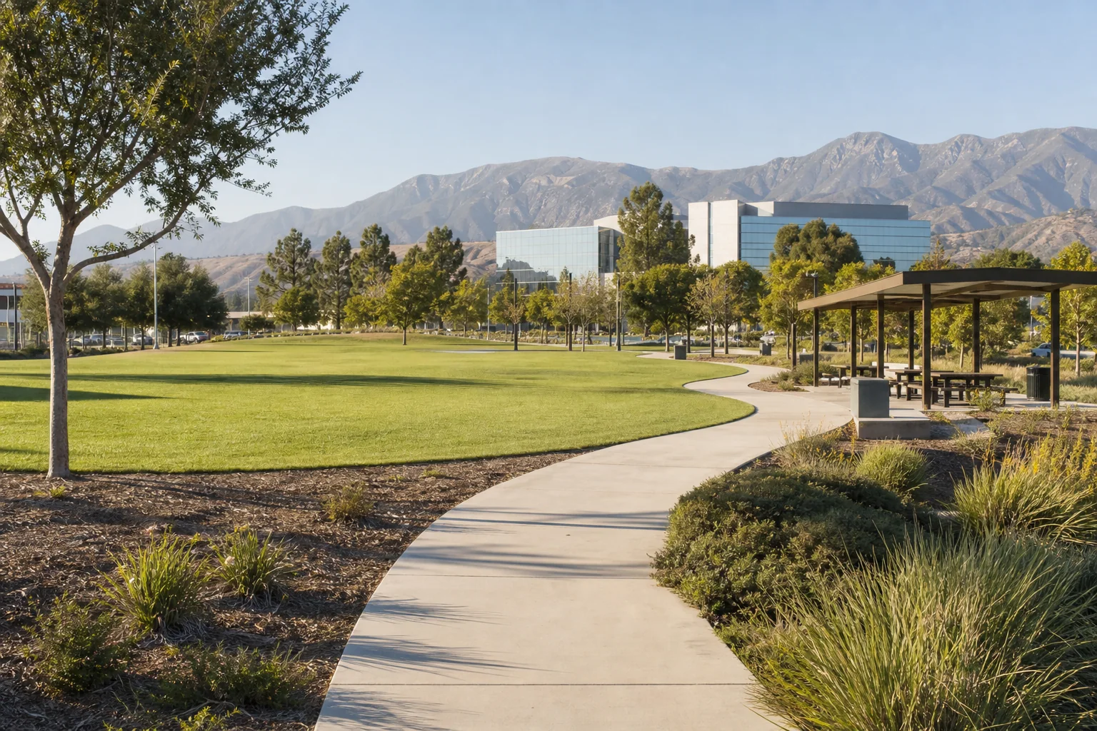 Open lawn, winding path, and foothill setting representing Central Park in Rancho Cucamonga