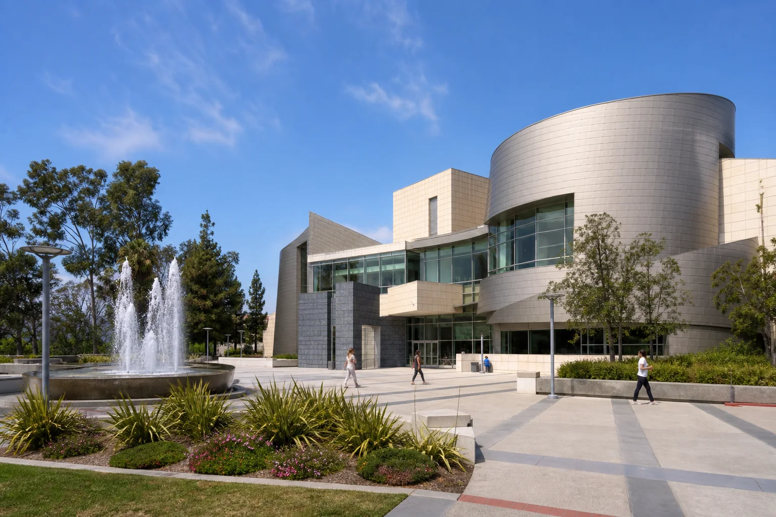Curved contemporary library architecture, fountain, and civic plaza representing Cerritos Library