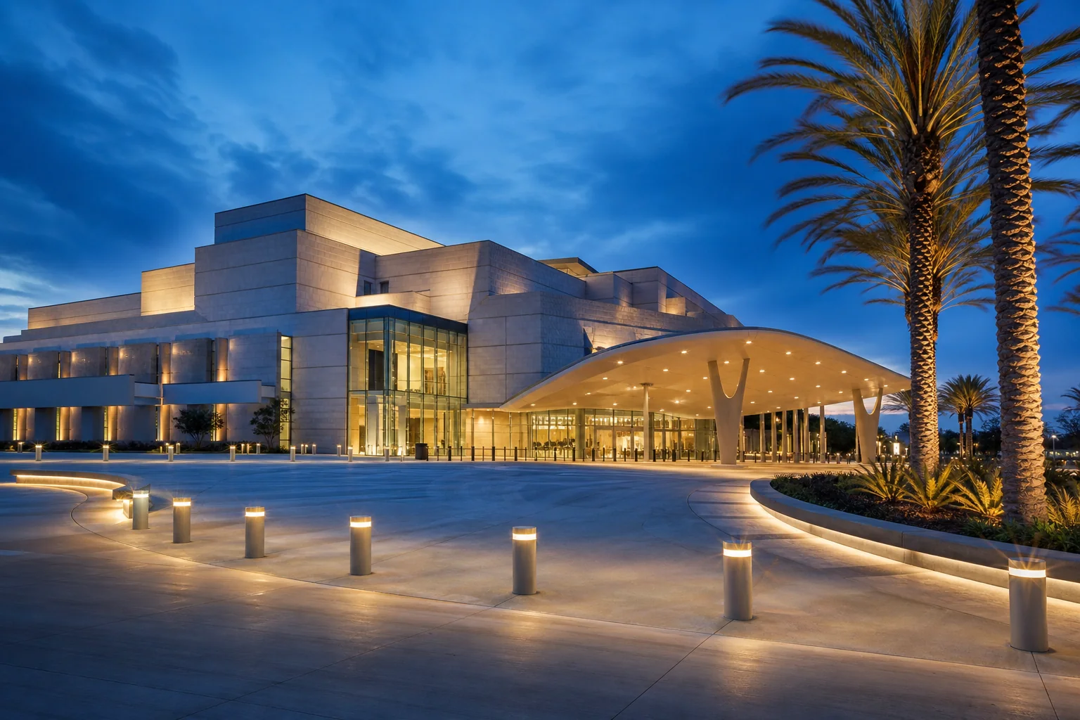 Illuminated geometric theater complex representing Cerritos Center for the Performing Arts