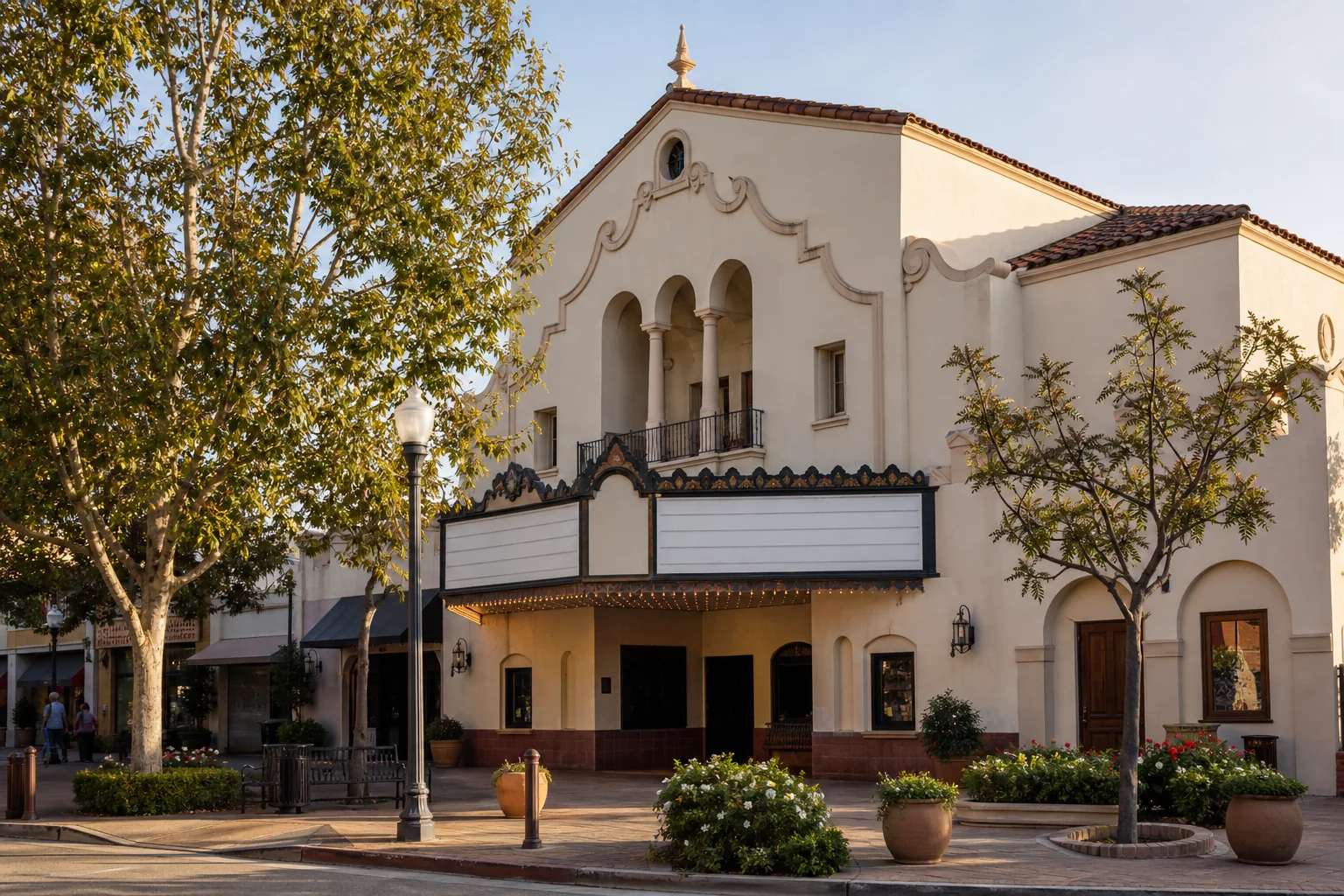 Historic community theater facade and marquee representing the Gem Theater