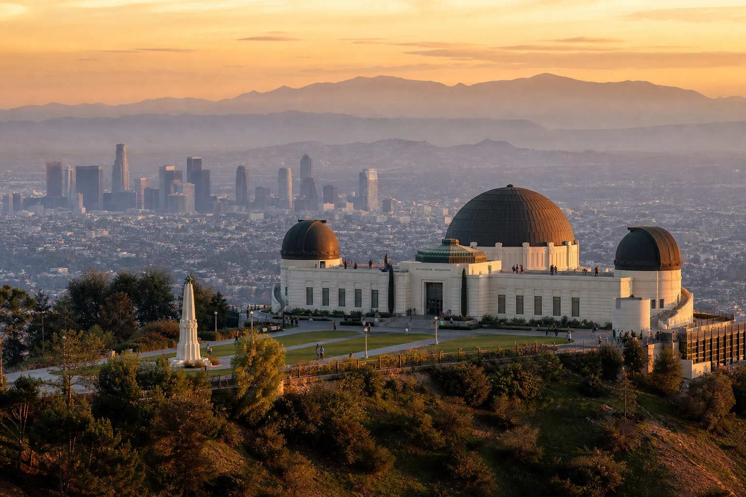 Art Deco observatory domes above the Los Angeles skyline representing Griffith Observatory