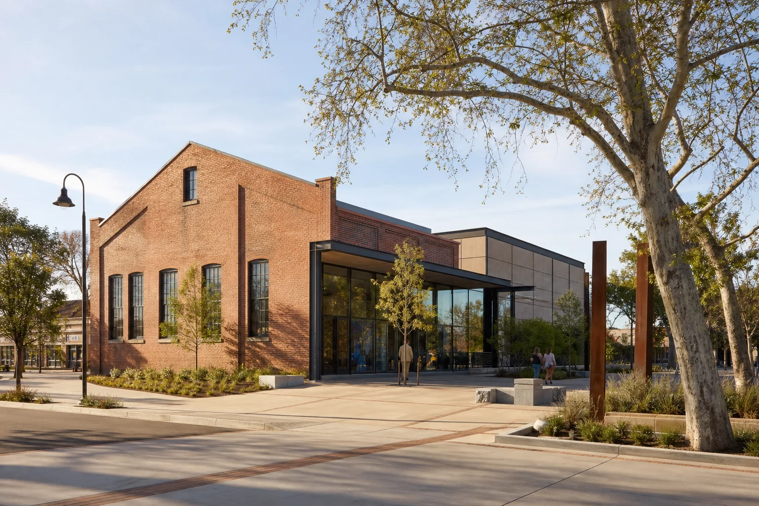Restored brick museum building and modern glass entrance representing the Hilbert Museum