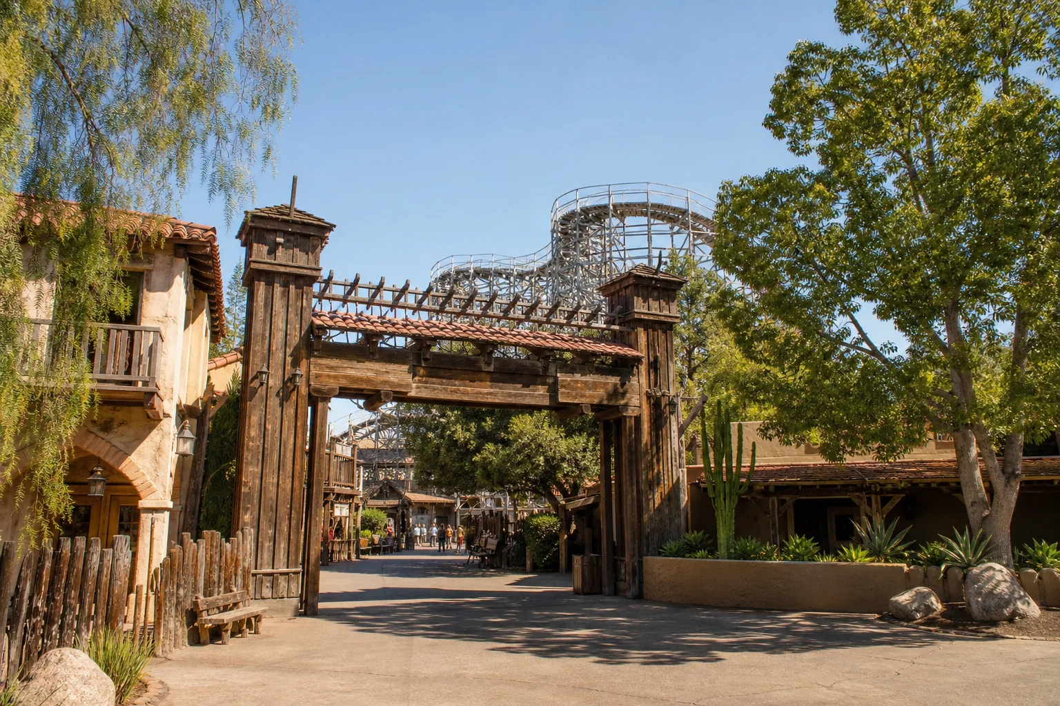Old West–style entrance and wooden roller coaster representing Knott’s Berry Farm