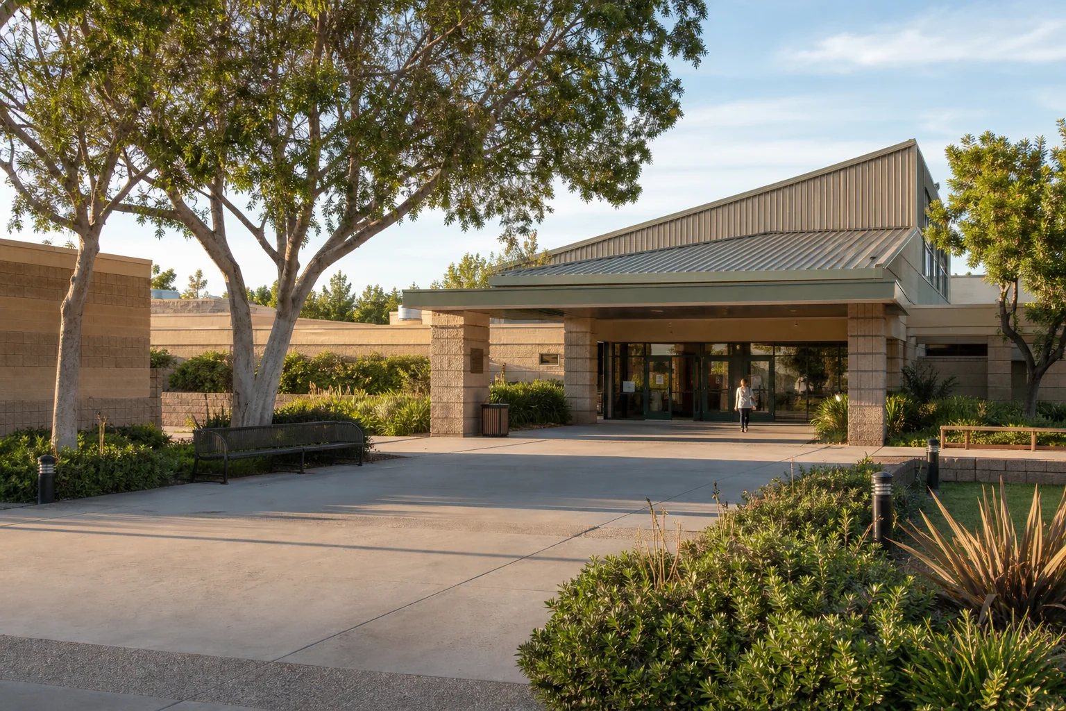 Covered entrance and landscaped forecourt representing La Palma Community Center