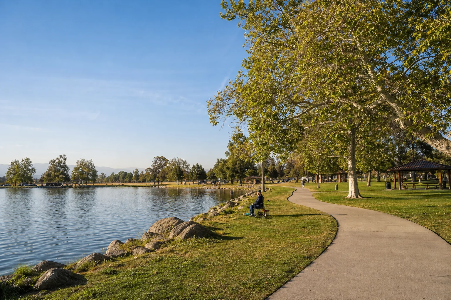 Fishing lake, walking path, and picnic shelters at Rancho Jurupa Park