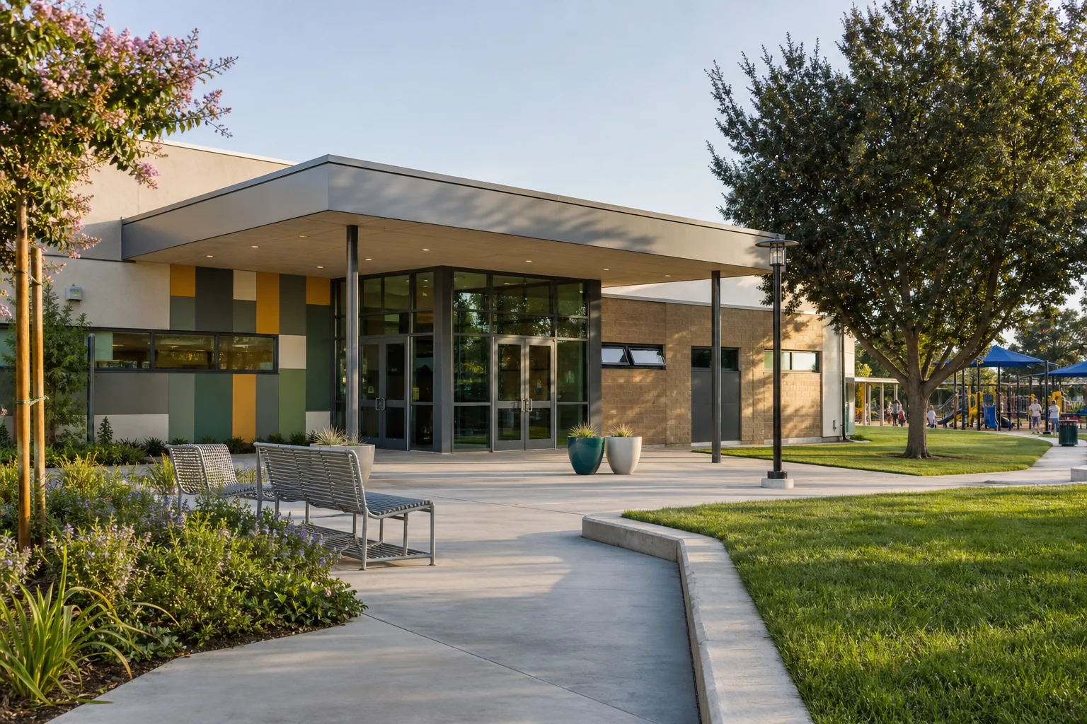 Modern community facility and adjacent green space representing Stanton Community Services