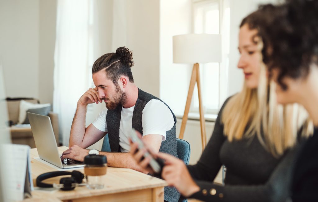 Small business owner working in a private office instead of from home