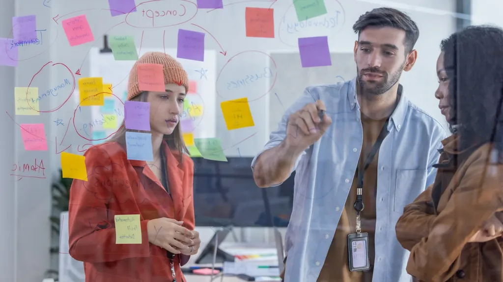 Business team planning a virtual office setup checklist together